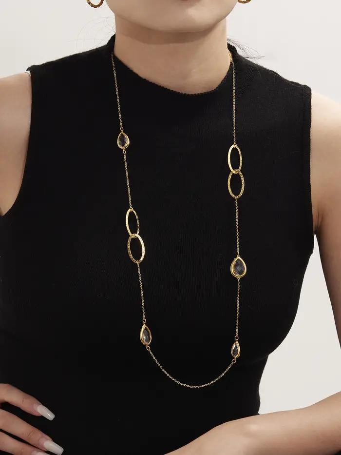 Collier chaîne de pull longue en acier inoxydable plaqué or avec gouttelettes brillantes et pierre de verre à facettes pour femmes occasions spéciales
