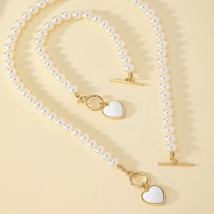 Ensemble de bijoux pour filles, 2 pièces, collier de perles d'imitation, Bracelet, pendentif élégant de couleur perle, perles de couleur naturelle