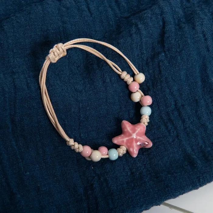 Bracelet en céramique étoile rose fait à la main pour femmes