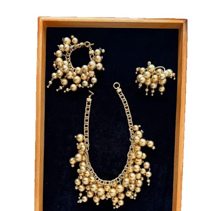 Collier, bracelet et bague rétro en laiton doré mat