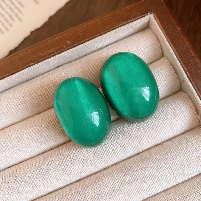 Boucles d'oreilles ovales en résine or jaune clair élégantes et sophistiquées pour femmes occasions spéciales