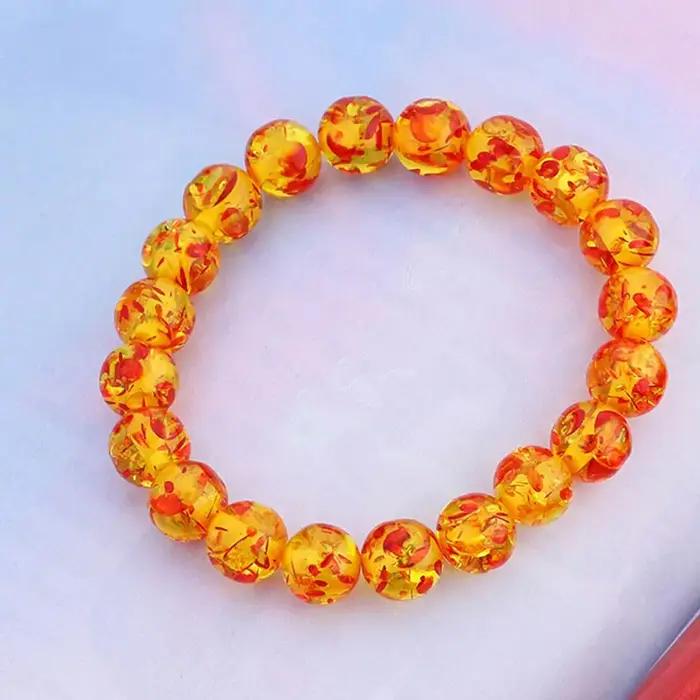 Bracelet de perles rondes extensibles en résine ambre 10 mm et 8 mm pour femme