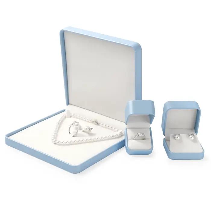 Boîte à bijoux bleue de qualité supérieure avec doublure en velours pour rangement et protection de colliers bagues boucles doreilles et bracelets occasions spéciales famille bijoutier