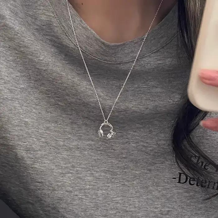 ANENJERY Collier avec pendentif nœud papillon couleur argent pour femmes