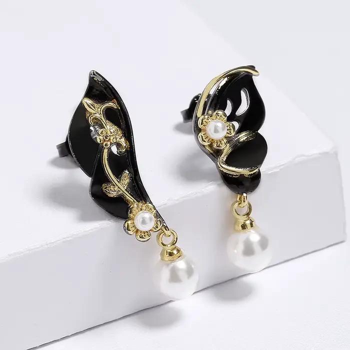 Boucles d'oreilles bicolores pour femmes, élégantes, de haute qualité, noires et dorées, bijoux fins, feuilles asymétriques, fleurs et douces
