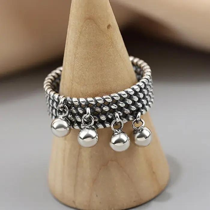 Bagues en argent avec pendentif pompon pour femme