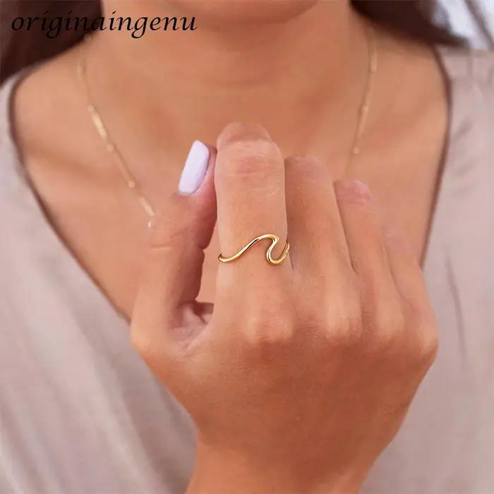 Bague en forme de vague de mer remplie d'or 14 carats pour femme