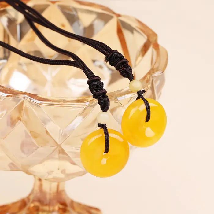 Pendentif en ambre naturel et cire d'abeille collier unisexe punk pour homme et femme cadeau anniversaire occasion spéciale