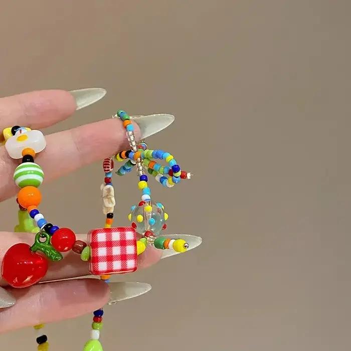 Collier ras du cou avec nœud de fruits de pomme