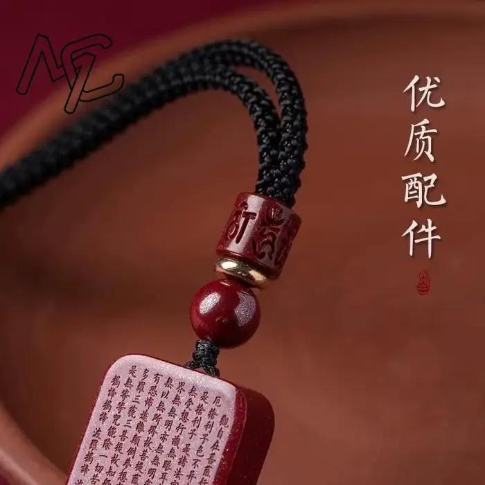 Pendentif en cinabre rouge sculpté du Sutra du Cœur Chinois