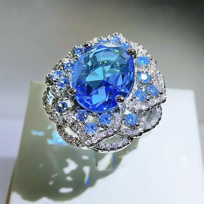 Bague à grandes fleurs en Zircon bleu scintillant pour femme