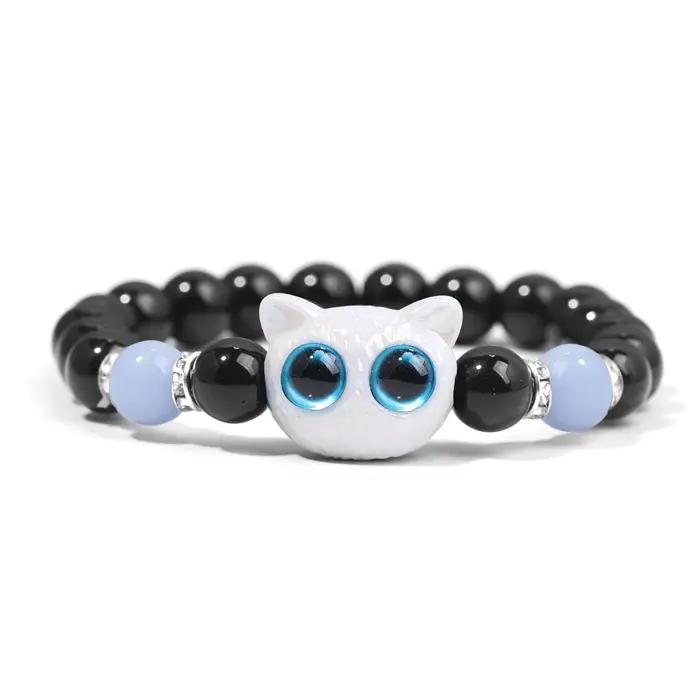 Couple de chat de dessin animé brillant avec paire de bracelets