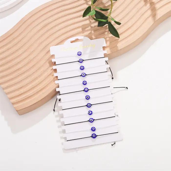 12 pièces Bracelets en corde noire et blanche en verre œil du diable bleu pour hommes et femmes Coup
