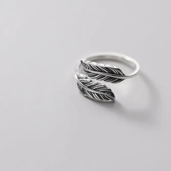 Bague en argent sterling 925 motif plume élégante pour femmes occasions spéciales engagement anniversaire mariage cadeau chic